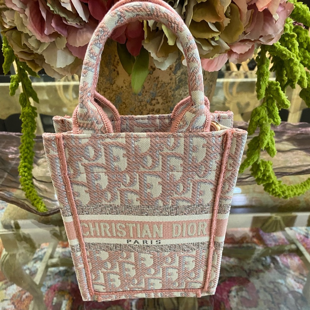 Christian Dior mini crossbody. Pink, gray and lavender in color